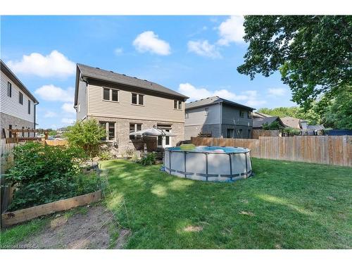 209 Woodway Trail, Simcoe, ON - Outdoor With Above Ground Pool With Backyard With Exterior