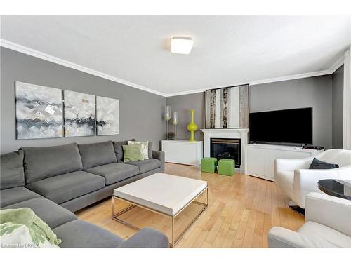 25 Russell Crescent, St. George, ON - Indoor Photo Showing Living Room With Fireplace