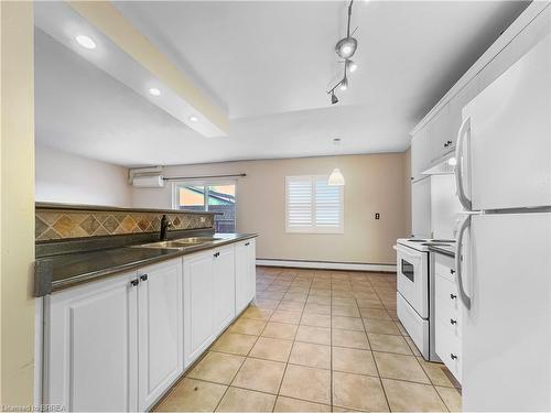 9-608 Grey Street, Brantford, ON - Indoor Photo Showing Kitchen With Double Sink