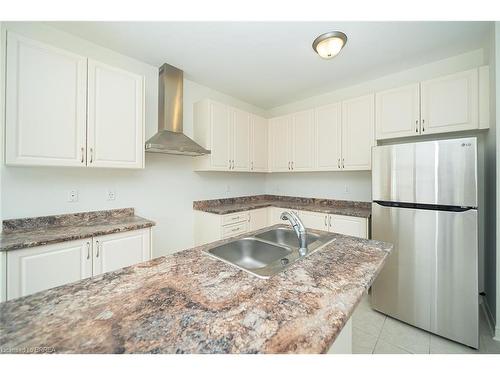 32 Oldham Avenue, Paris, ON - Indoor Photo Showing Kitchen With Double Sink