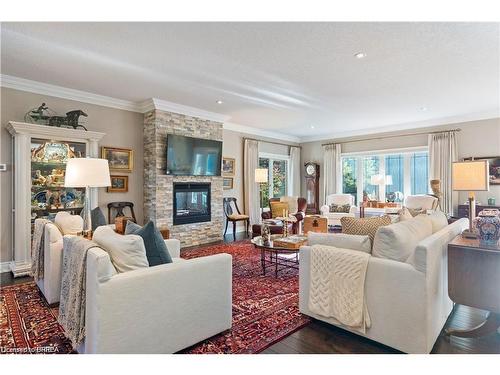 14 Wingrove Woods, Brantford, ON - Indoor Photo Showing Living Room With Fireplace