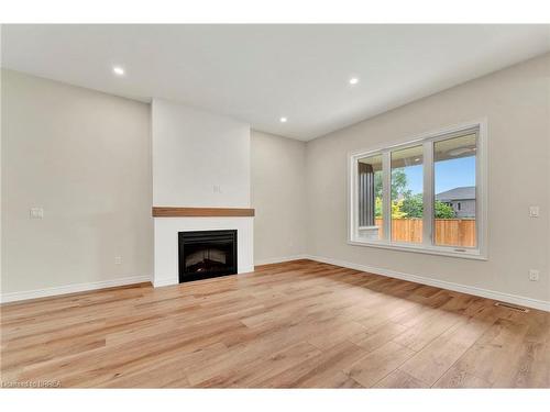 3-68 Cedar Street, Paris, ON - Indoor Photo Showing Living Room With Fireplace