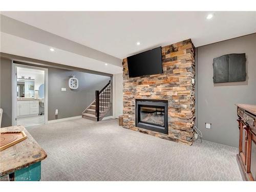 18-158 Willow Street, Paris, ON - Indoor Photo Showing Living Room With Fireplace