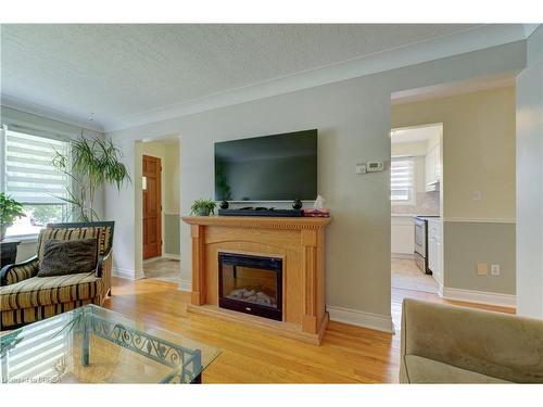 28 Allanton Boulevard, Brantford, ON - Indoor Photo Showing Living Room With Fireplace