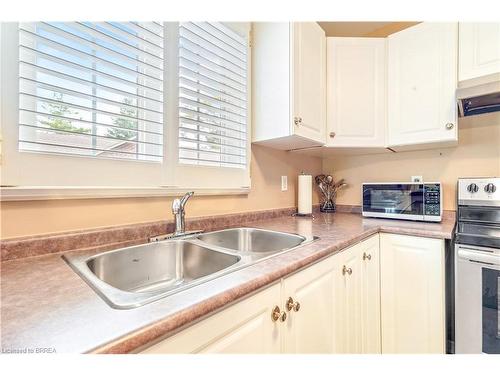 4-10 Courtland Drive, Brantford, ON - Indoor Photo Showing Kitchen With Double Sink