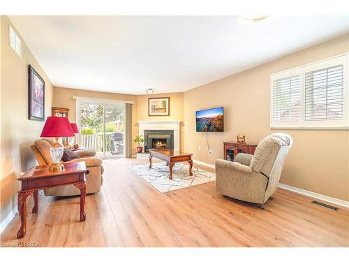 4-10 Courtland Drive, Brantford, ON - Indoor Photo Showing Living Room With Fireplace