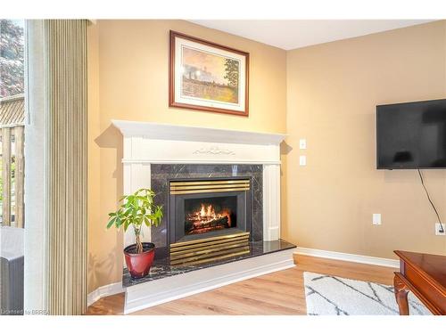 4-10 Courtland Drive, Brantford, ON - Indoor Photo Showing Living Room With Fireplace
