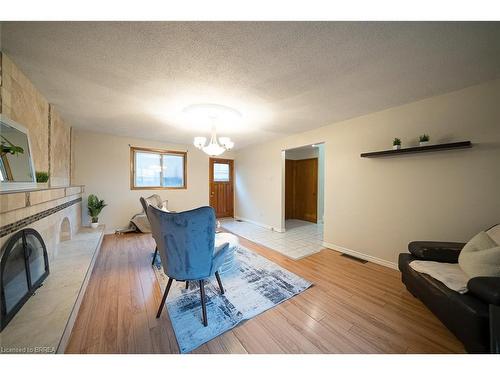 98 Ferguson Avenue N, Hamilton, ON - Indoor Photo Showing Other Room With Fireplace