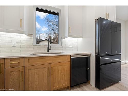 16-5 John Pound Road, Tillsonburg, ON - Indoor Photo Showing Kitchen With Double Sink