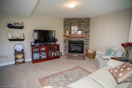 6-158 Willow Street, Paris, ON - Indoor Photo Showing Living Room With Fireplace