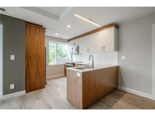 110-34 Norman Street, Brantford, ON - Indoor Photo Showing Kitchen With Double Sink