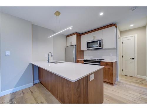 208-34 Norman Street, Brantford, ON - Indoor Photo Showing Kitchen With Double Sink With Upgraded Kitchen