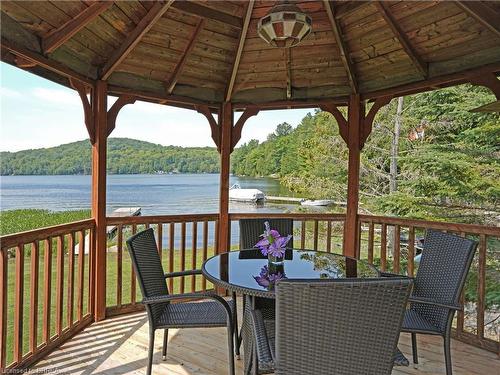 391 Pine Drive, Bancroft, ON - Outdoor With Body Of Water With Deck Patio Veranda With View With Exterior