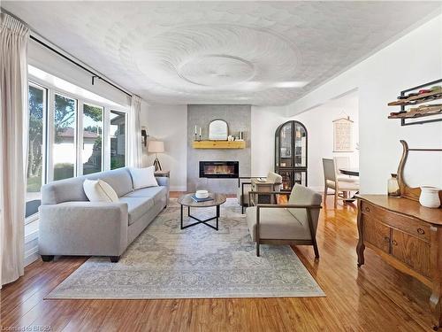 9 Normandy Circle, Simcoe, ON - Indoor Photo Showing Living Room With Fireplace