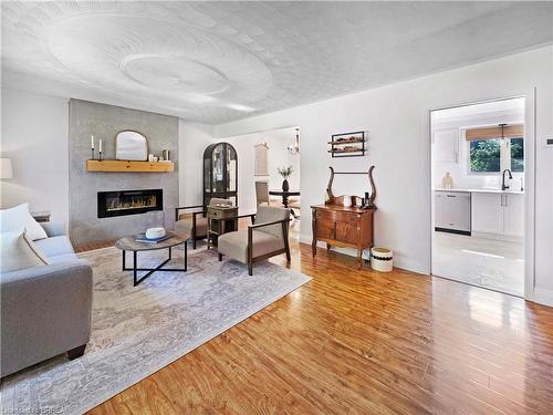 9 Normandy Circle, Simcoe, ON - Indoor Photo Showing Living Room With Fireplace