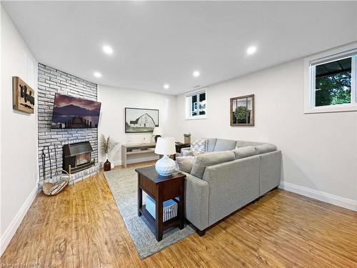 9 Normandy Circle, Simcoe, ON - Indoor Photo Showing Living Room With Fireplace