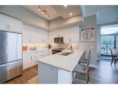 115-1878 Gordon Street, Guelph, ON - Indoor Photo Showing Kitchen With Double Sink With Upgraded Kitchen