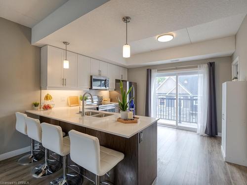 E12-439 Athlone Avenue, Woodstock, ON - Indoor Photo Showing Kitchen With Double Sink