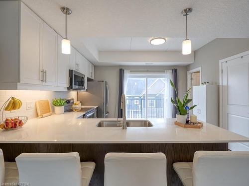 E12-439 Athlone Avenue, Woodstock, ON - Indoor Photo Showing Kitchen With Double Sink With Upgraded Kitchen