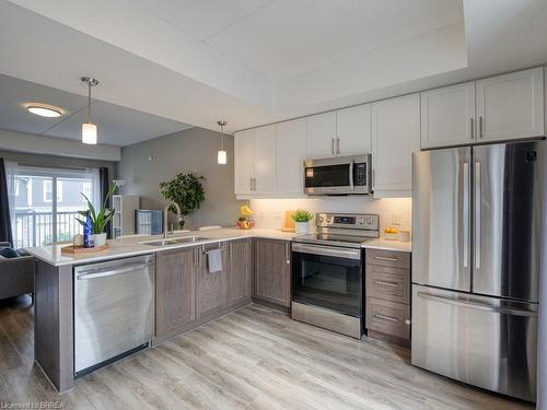 E12-439 Athlone Avenue, Woodstock, ON - Indoor Photo Showing Kitchen With Double Sink