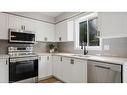 5-7 Southside Place, Hamilton, ON  - Indoor Photo Showing Kitchen With Stainless Steel Kitchen With Double Sink 