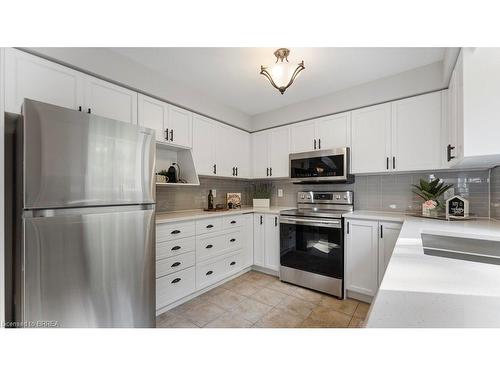 5-7 Southside Place, Hamilton, ON - Indoor Photo Showing Kitchen With Stainless Steel Kitchen