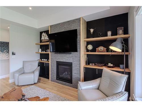 228 Oak Street, Simcoe, ON - Indoor Photo Showing Living Room With Fireplace