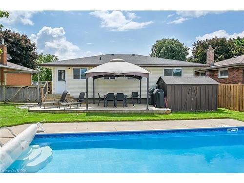 10 Pembroke Avenue, Brantford, ON - Outdoor With In Ground Pool With Deck Patio Veranda With Backyard