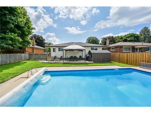 10 Pembroke Avenue, Brantford, ON - Outdoor With In Ground Pool With Backyard