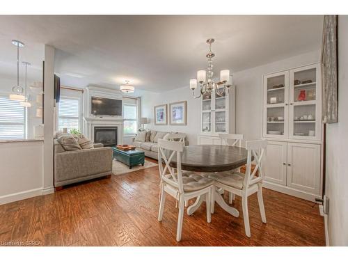 70 Anastasia Crescent, Brantford, ON - Indoor Photo Showing Dining Room With Fireplace