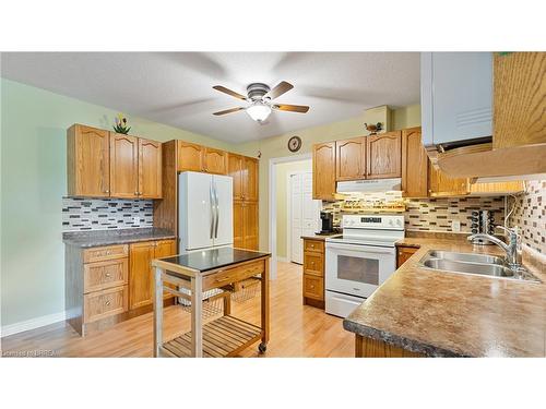 209-111 Grey Street, Brantford, ON - Indoor Photo Showing Kitchen With Double Sink