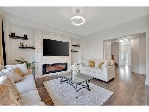 6 Tarrison Street, Brantford, ON - Indoor Photo Showing Living Room With Fireplace