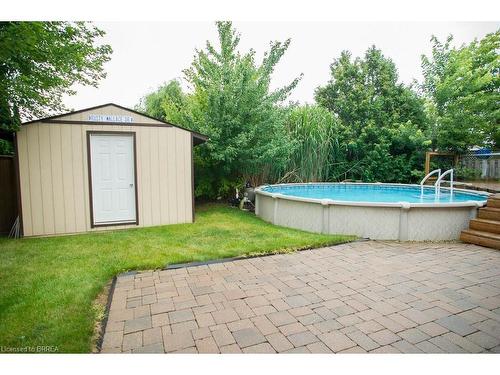 23 Garners Lane, Brantford, ON - Outdoor With Above Ground Pool With Backyard