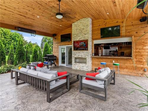 233 Oakland Road, Scotland, ON - Outdoor With Fireplace With Deck Patio Veranda With Exterior