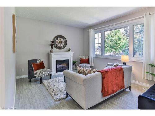 6 Wildflower Lane, Brantford, ON - Indoor Photo Showing Living Room With Fireplace