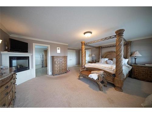 1895 Concession 4 Road Concession, Virgil, ON - Indoor Photo Showing Bedroom With Fireplace