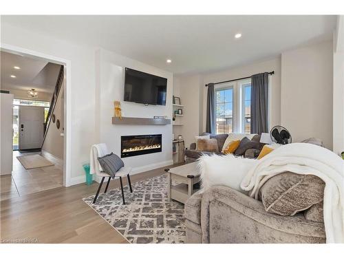 61-49 Royal Dornoch Drive, St. Thomas, ON - Indoor Photo Showing Living Room With Fireplace