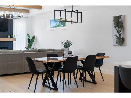 6 Macneil Court, Port Burwell, ON - Indoor Photo Showing Dining Room With Fireplace