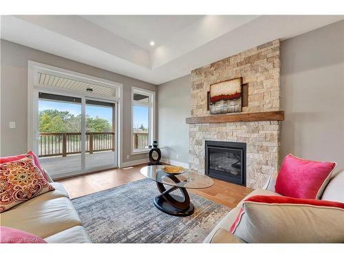 105 Craddock Boulevard, Jarvis, ON - Indoor Photo Showing Living Room With Fireplace