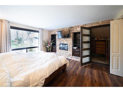 226 Mclean School Road, St. George, ON - Indoor Photo Showing Bedroom With Fireplace