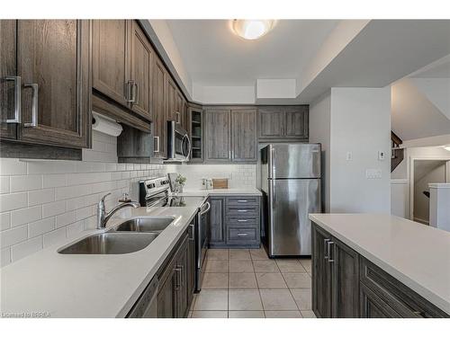 11-1 Tom Brown Drive, Paris, ON - Indoor Photo Showing Kitchen With Double Sink