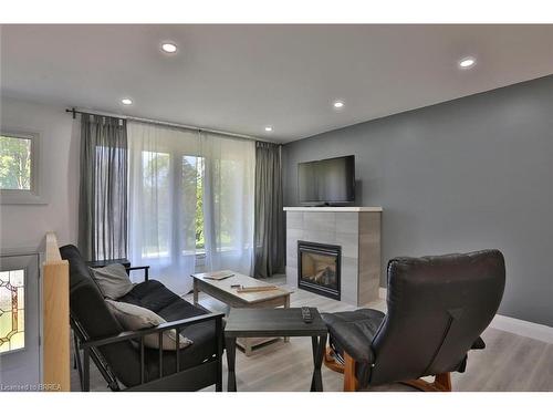 73 Milton Street, New Hamburg, ON - Indoor Photo Showing Living Room With Fireplace