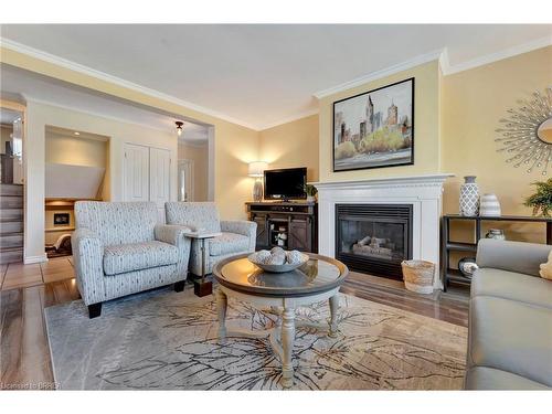 73 Rouse Avenue, Cambridge, ON - Indoor Photo Showing Living Room With Fireplace