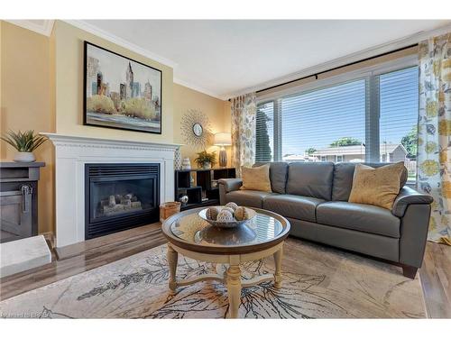 73 Rouse Avenue, Cambridge, ON - Indoor Photo Showing Living Room With Fireplace