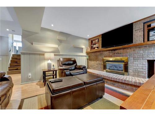 73 Rouse Avenue, Cambridge, ON - Indoor Photo Showing Living Room With Fireplace