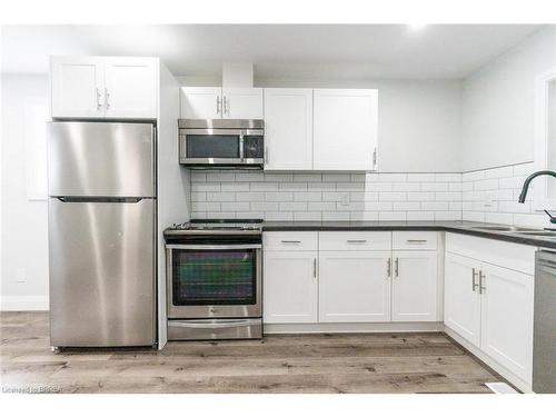 11 Washington Street, Brantford, ON - Indoor Photo Showing Kitchen With Double Sink