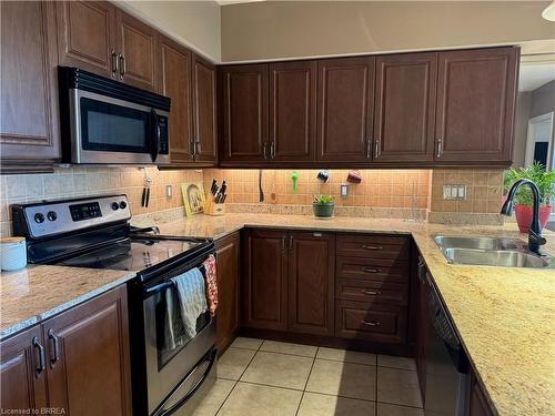 403-47 Caroline Street N, Hamilton, ON - Indoor Photo Showing Kitchen With Stainless Steel Kitchen With Double Sink