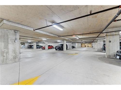 410-170 Water Street N, Cambridge, ON - Indoor Photo Showing Garage