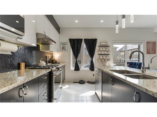 26 Doug Foulds Way, Paris, ON - Indoor Photo Showing Kitchen With Double Sink With Upgraded Kitchen