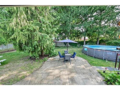 31 Harvest Lane, Brantford, ON - Outdoor With Above Ground Pool With Backyard